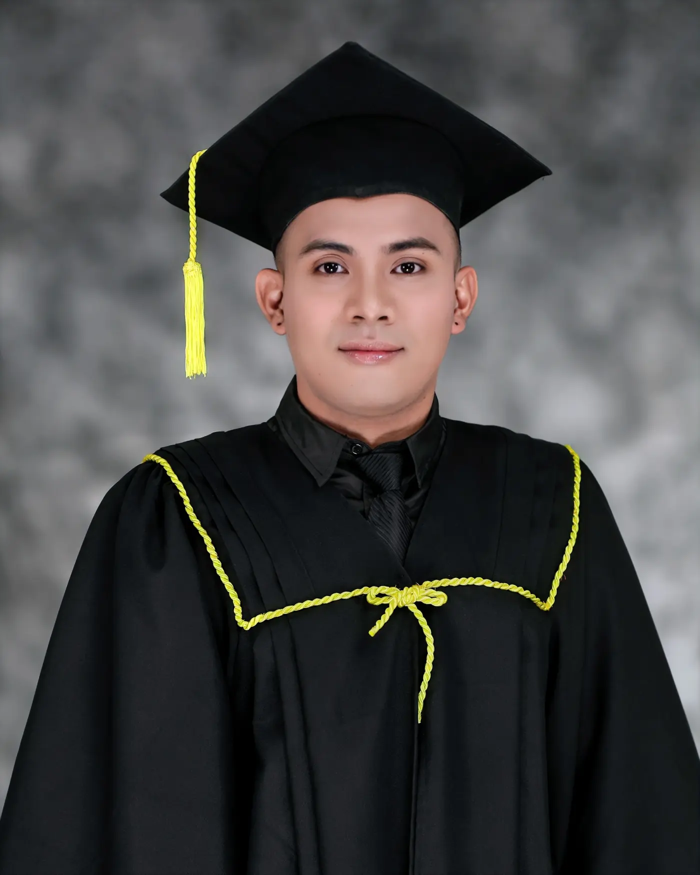 Christian Jay Villa in graduation attire